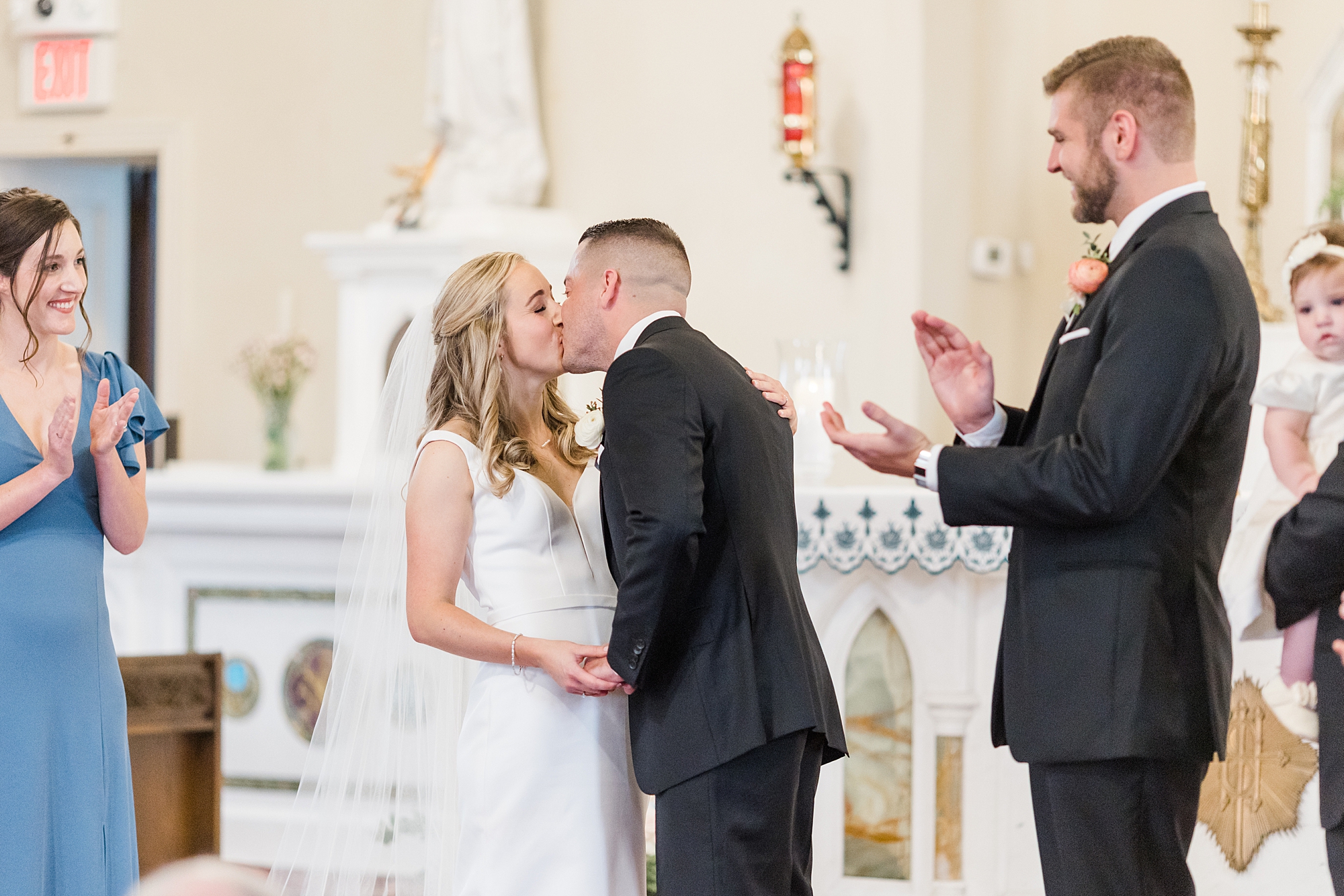 couple kisses for the first time as husband and wife 