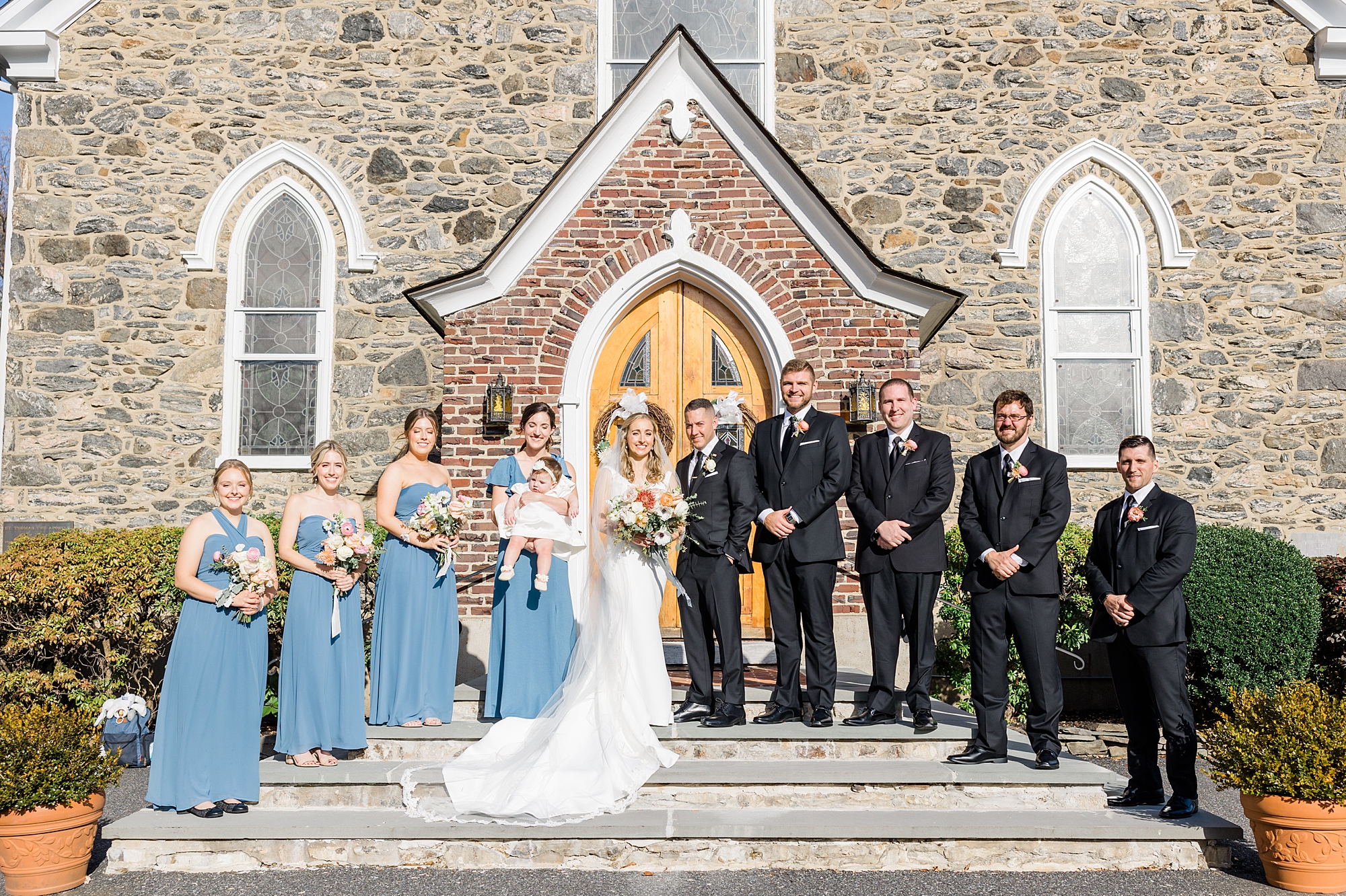 wedding party in front of church