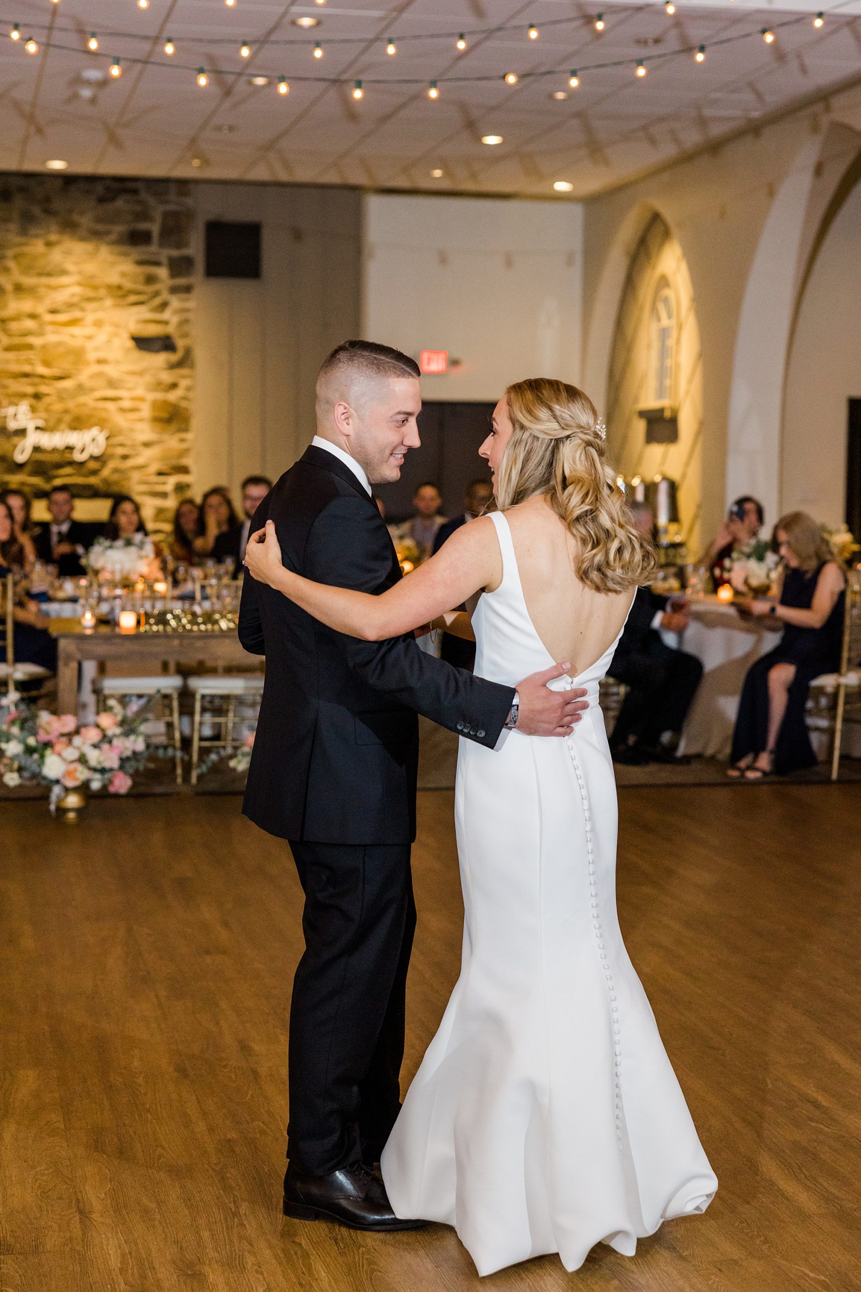 newlyweds share first dance togehter