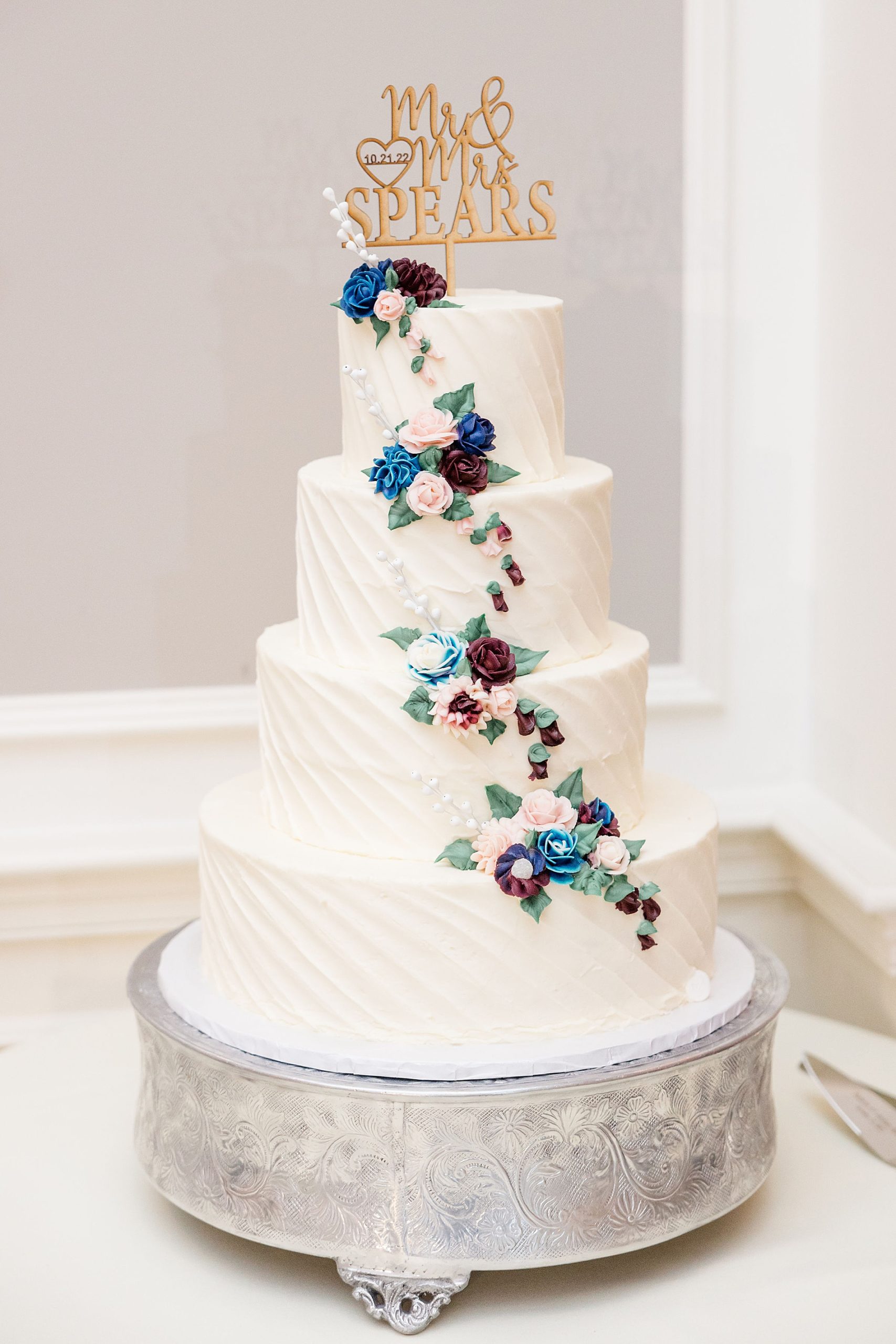 classic and elegant four tiered wedding cake