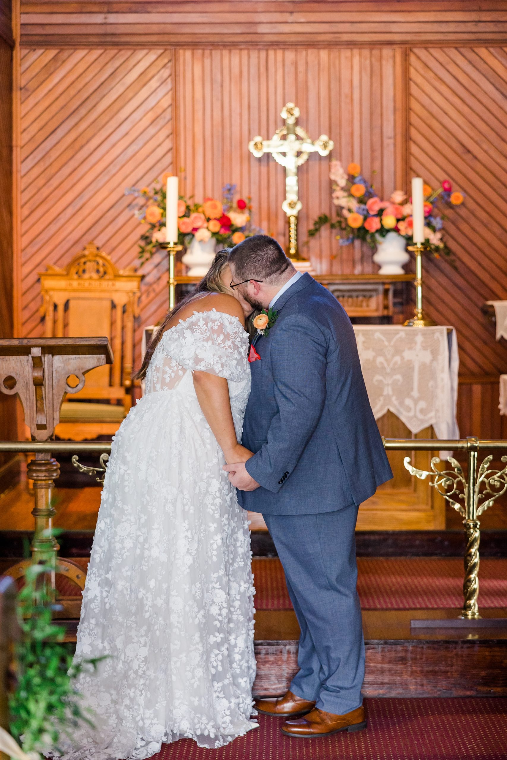couple kiss during Intimate Cape May Wedding ceremony
