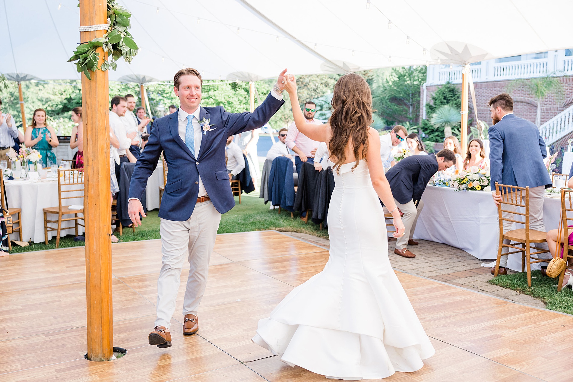 bride and groom dance together 