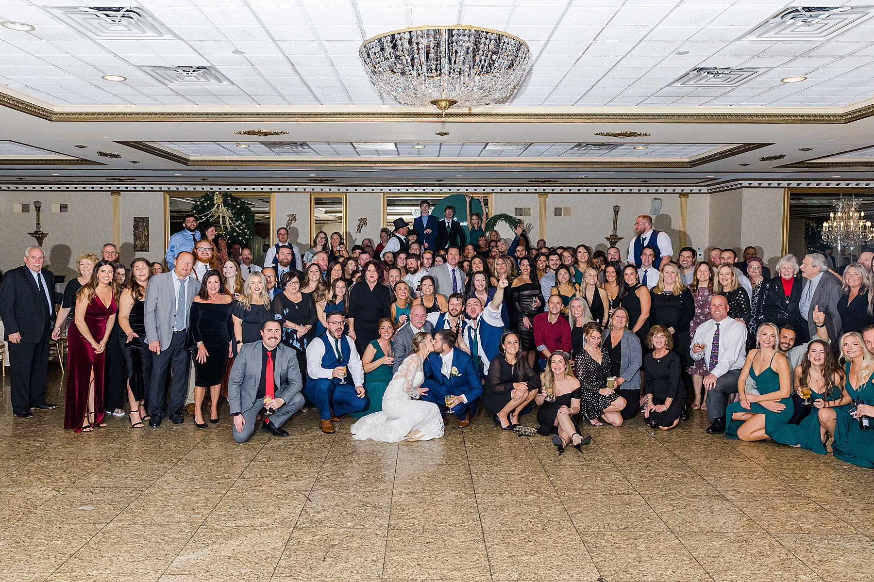 wedding guests with bride and groom at Concordville Inn Winter Wedding in Glen Mills, PA
