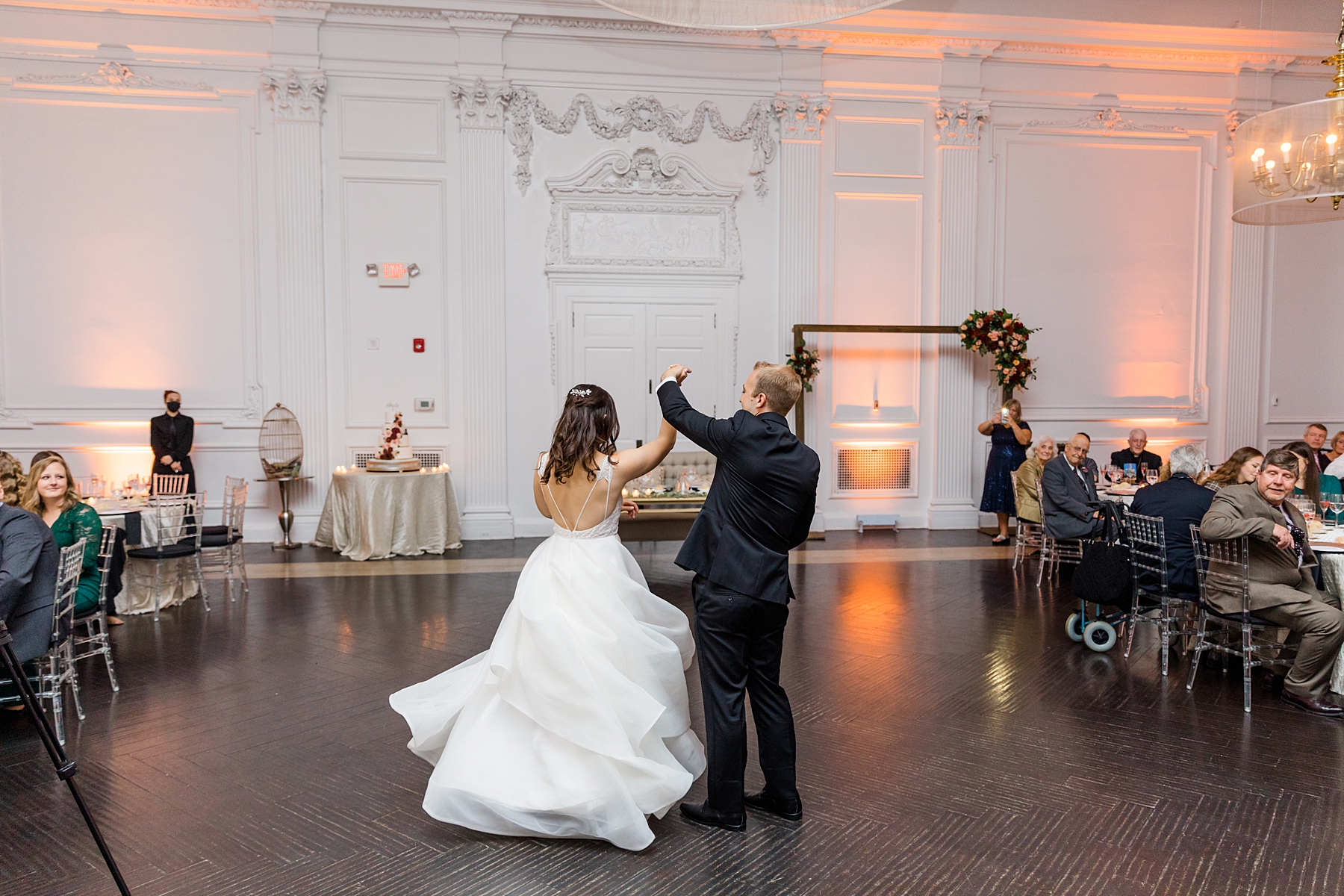 couple share first dance during wedding reception at The Down Town Club in Philadelphia, PA